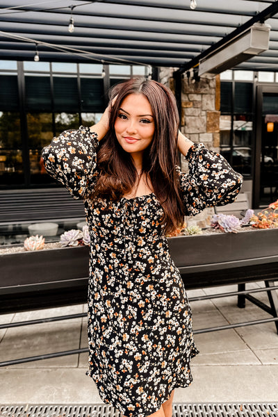 The Back in the Game Black Floral Print Long Sleeve Mini Dress