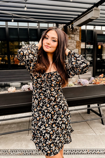The Back in the Game Black Floral Print Long Sleeve Mini Dress