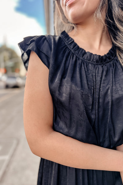 The Cast in Stone Black Printed Midi Dress