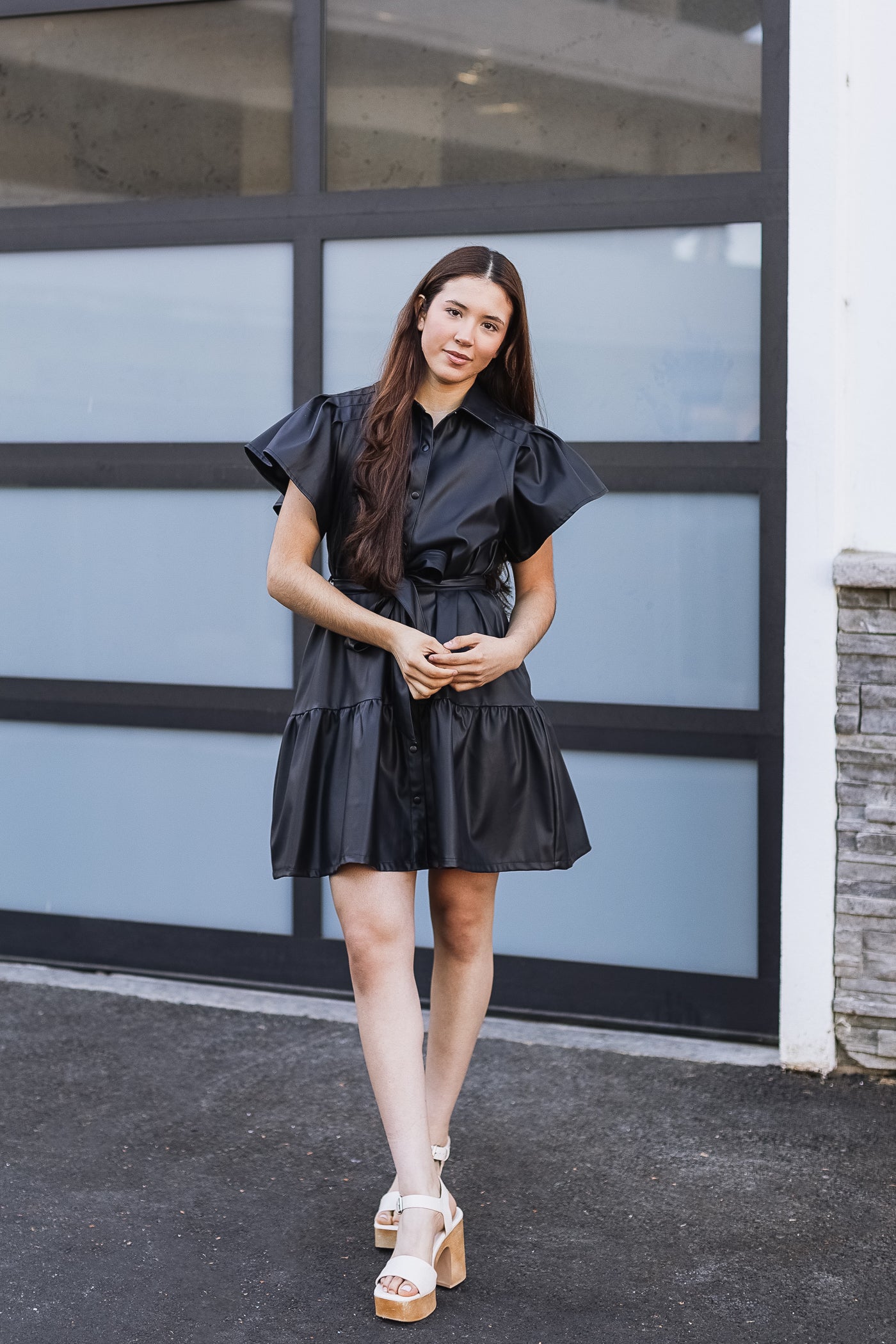 The Shake It Off Black Faux Leather Mini Dress