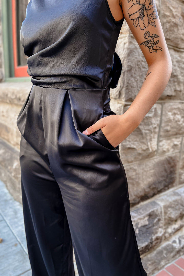 The Watch Her Shine Black Satin Jumpsuit