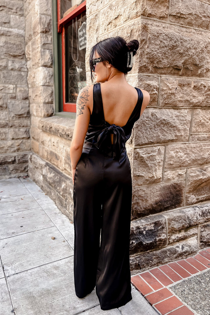 The Watch Her Shine Black Satin Jumpsuit