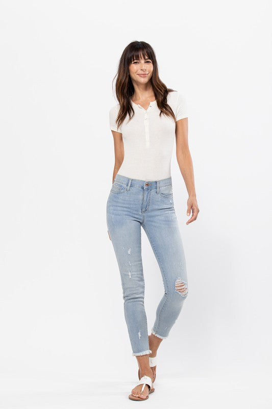 The Shayna Mid Rise Distressed Skinny Jeans