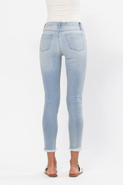 The Shayna Mid Rise Distressed Skinny Jeans