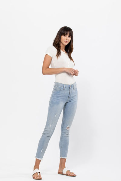 The Shayna Mid Rise Distressed Skinny Jeans